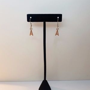 Alphabet Earrings Each Pair sold separately.